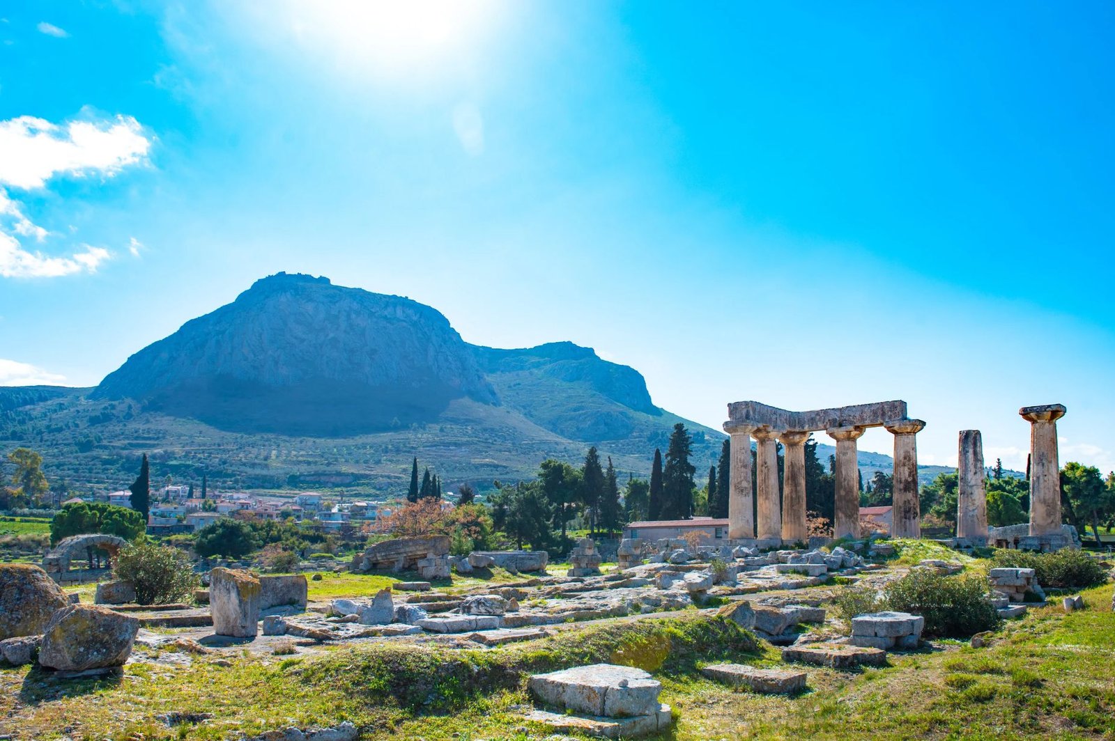 Remnants Of The Temple Of Apollo At Delphi, Highlighting The Historical Significance Of Ancient Greek Civilization